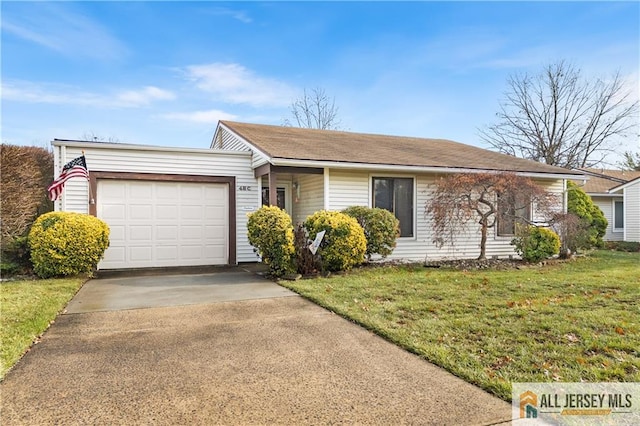 ranch-style home featuring a garage, concrete driveway, and a front lawn