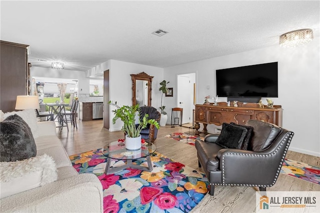 275 Convent Rd Unit 275A, Monroe, NJ 08831 - living area featuring light wood-style floors and baseboards