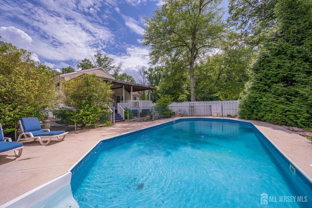 101 Weston Rd, Franklin, NJ 08873 - view of swimming pool with stairway, a patio area, and a fenced backyard