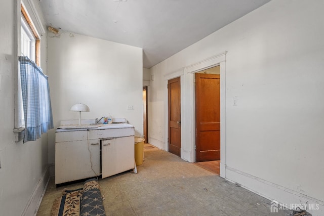 183 State St, Perth Amboy, NJ 08861 - laundry area with light floors