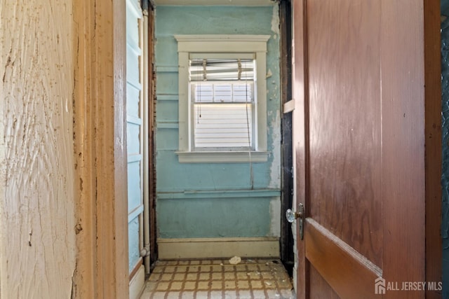 183 State St, Perth Amboy, NJ 08861 - detailed view of tile patterned floors and baseboards