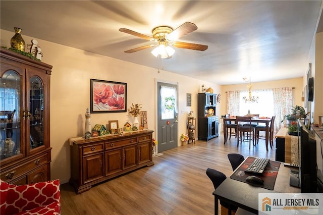 7 Cornell Rd, Old Bridge, NJ 08859 - living area with a chandelier, light wood-style flooring, plenty of natural light, and a ceiling fan