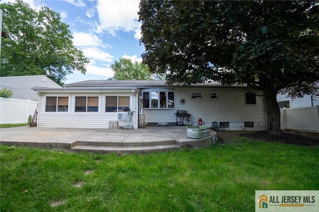 7 Cornell Rd, Old Bridge, NJ 08859 - rear view of house with a patio area