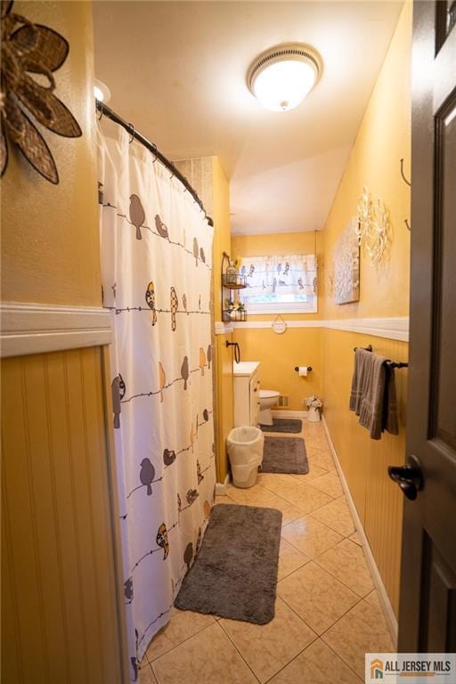 7 Cornell Rd, Old Bridge, NJ 08859 - full bath featuring toilet, tile patterned floors, curtained shower, and baseboards