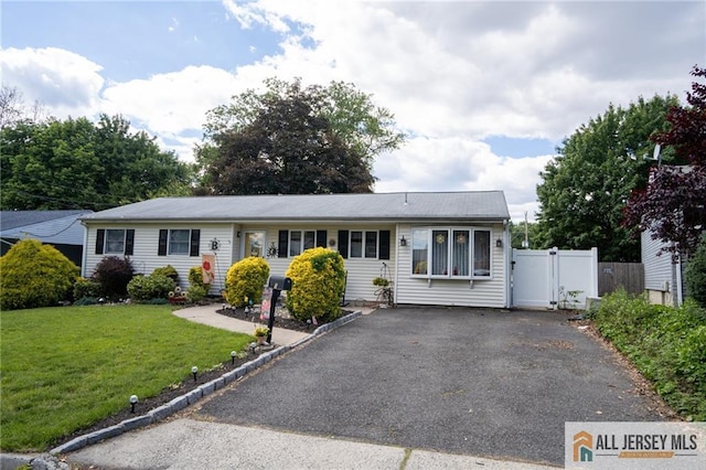 7 Cornell Rd, Old Bridge, NJ 08859 - single story home featuring a gate and driveway