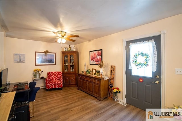 7 Cornell Rd, Old Bridge, NJ 08859 - foyer featuring ceiling fan and light wood finished floors