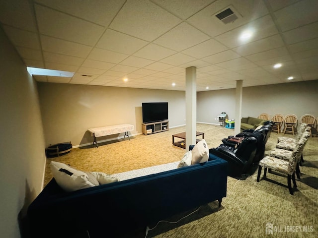 carpeted living area with recessed lighting, visible vents, and a paneled ceiling