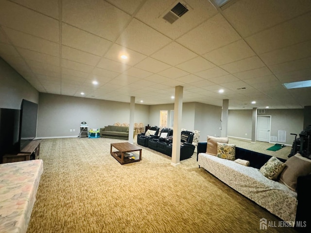carpeted living area featuring visible vents, recessed lighting, baseboards, and a paneled ceiling