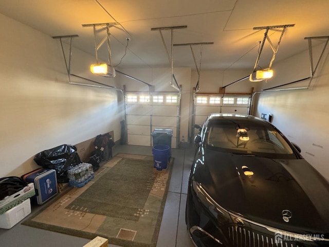 garage featuring a garage door opener