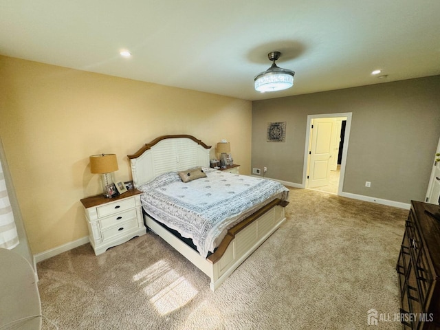 bedroom featuring recessed lighting, baseboards, and light colored carpet