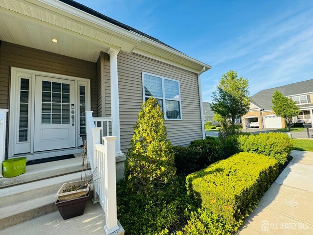 property entrance with a porch
