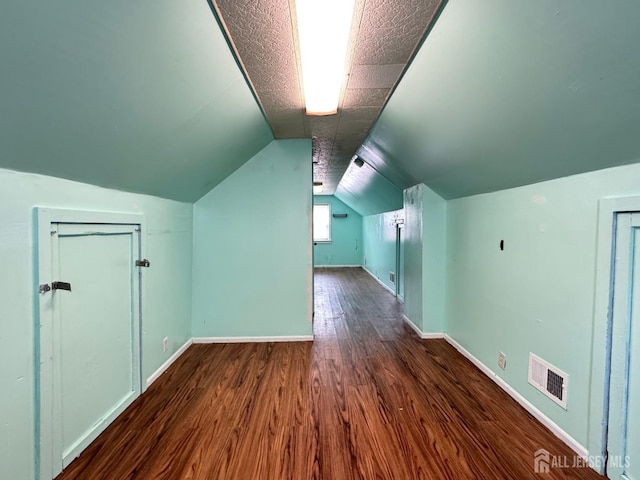 341 David St, South Amboy, NJ 08879 - additional living space featuring dark wood-style floors and vaulted ceiling