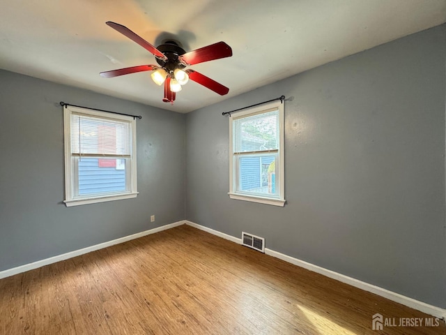 341 David St, South Amboy, NJ 08879 - unfurnished room with wood finished floors and ceiling fan