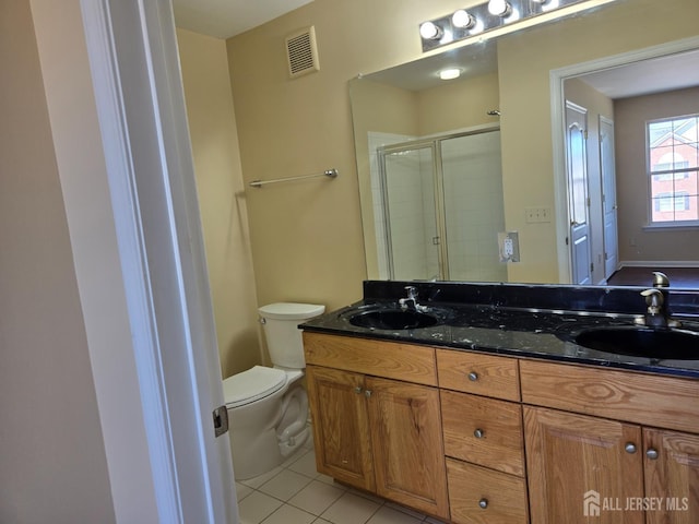 1338 Fernwood Ct, New Brunswick, NJ 08901 - bathroom with double vanity, toilet, a shower stall, and tile patterned flooring