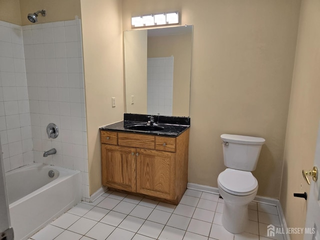 1338 Fernwood Ct, New Brunswick, NJ 08901 - bathroom with toilet, vanity, tile patterned floors, shower / bathtub combination, and baseboards