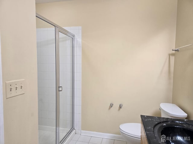 1338 Fernwood Ct, New Brunswick, NJ 08901 - bathroom featuring toilet, a shower stall, vanity, and tile patterned floors