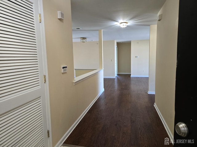 1338 Fernwood Ct, New Brunswick, NJ 08901 - corridor with dark wood finished floors and baseboards