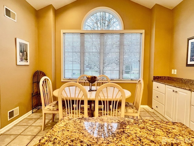 46 Dawson Ln, Monroe, NJ 08831 - dining room with visible vents, baseboards, lofted ceiling, and light tile patterned floors
