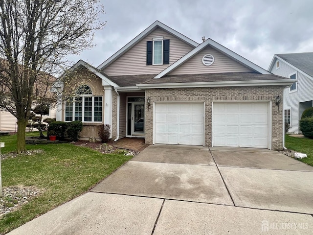 46 Dawson Ln, Monroe, NJ 08831 - traditional-style home featuring driveway, a front yard, roof with shingles, brick siding, and an attached garage