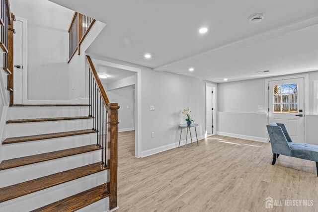 unfurnished room featuring light hardwood / wood-style flooring