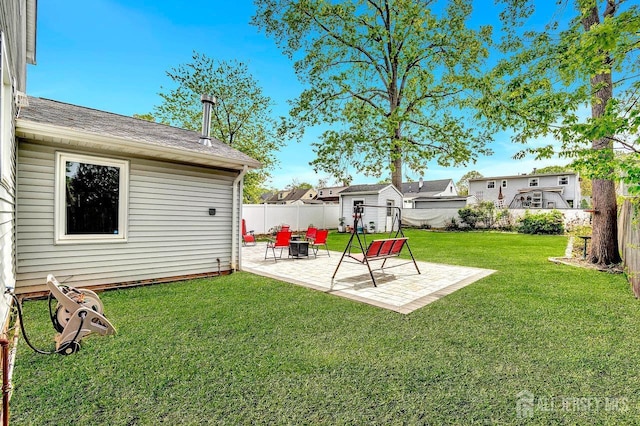 view of yard featuring a fenced backyard and a patio area