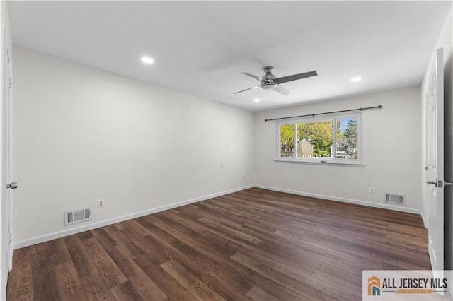 unfurnished bedroom with dark wood finished floors, baseboards, recessed lighting, and ceiling fan