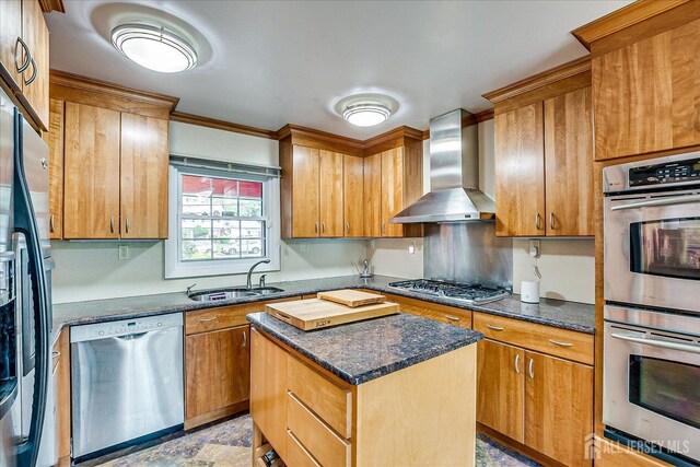 27 Landry Rd, Franklin Twsp, NJ 08873 - kitchen with stainless steel appliances, wall chimney range hood, a kitchen island, ornamental molding, and dark stone countertops