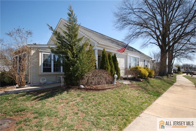176 Rossmoor Dr Unit C, Monroe, NJ 08831 - view of property exterior with a yard