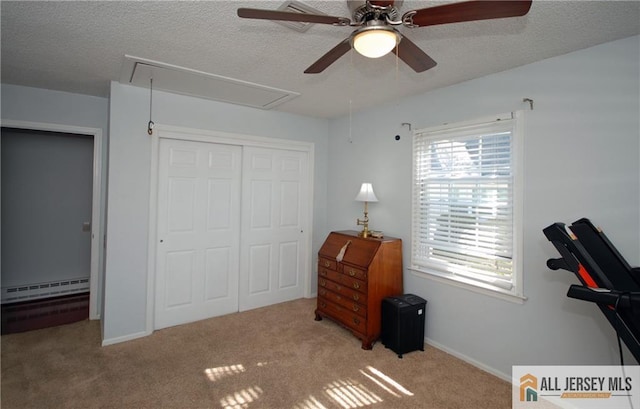 176 Rossmoor Dr Unit C, Monroe, NJ 08831 - bedroom with attic access, baseboard heating, a closet, a textured ceiling, and carpet flooring