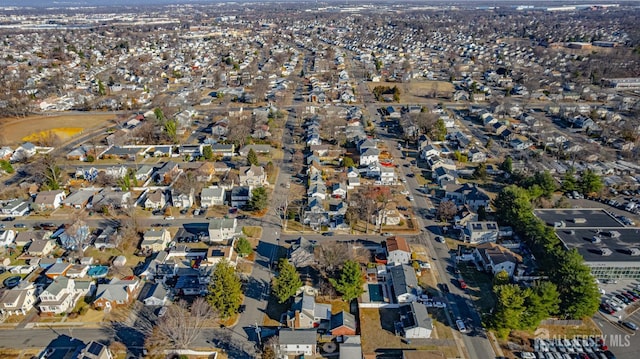 birds eye view of property with a residential view