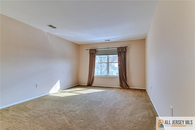 view of carpeted spare room