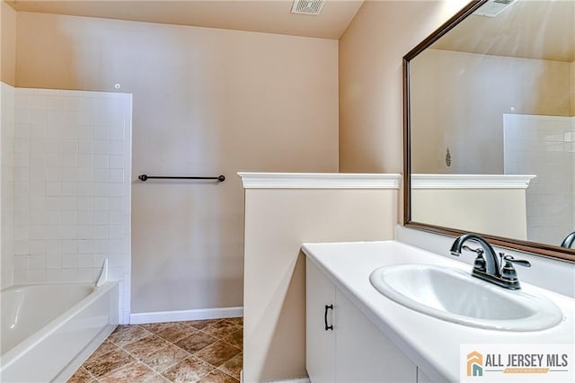 bathroom with vanity and shower / bathing tub combination