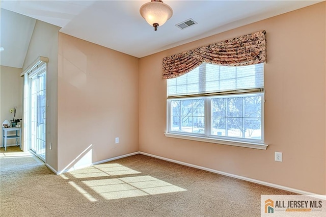 view of carpeted spare room