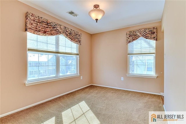 view of carpeted spare room