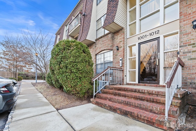 1006 Hidden Village Dr, Perth Amboy, NJ 08861 - property entrance with brick siding
