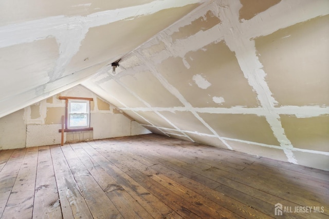 373 Rushmore Ave, Piscataway, NJ 08854 - bonus room featuring hardwood / wood-style floors and vaulted ceiling