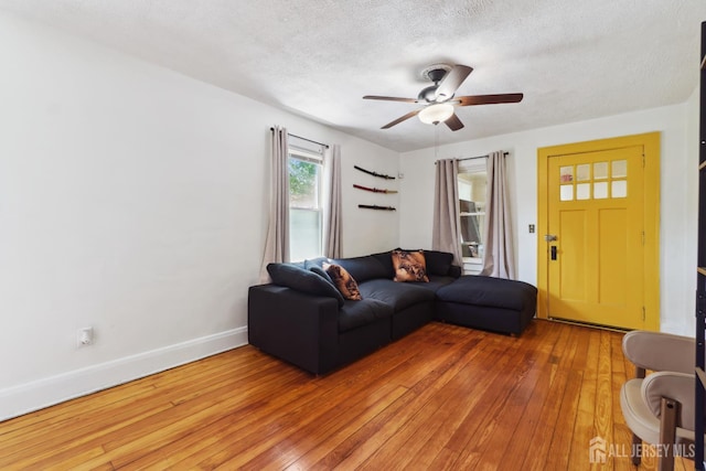 373 Rushmore Ave, Piscataway, NJ 08854 - living room featuring ceiling fan, light wood finished floors, and a textured ceiling