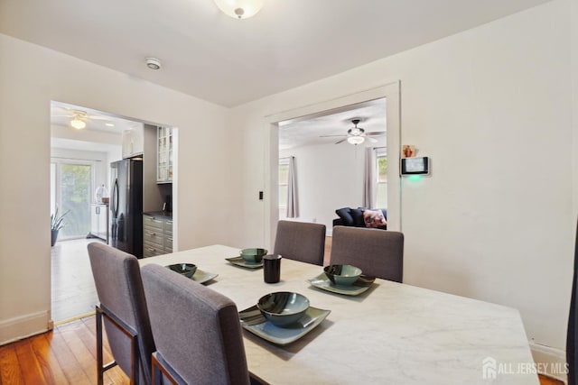 373 Rushmore Ave, Piscataway, NJ 08854 - dining room with light wood-style flooring and ceiling fan