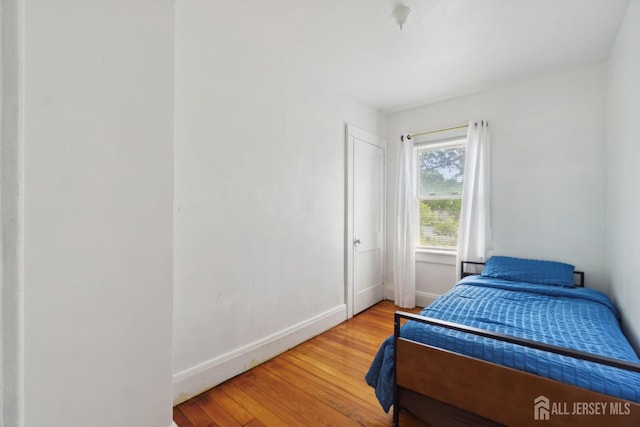 373 Rushmore Ave, Piscataway, NJ 08854 - bedroom featuring wood finished floors and baseboards