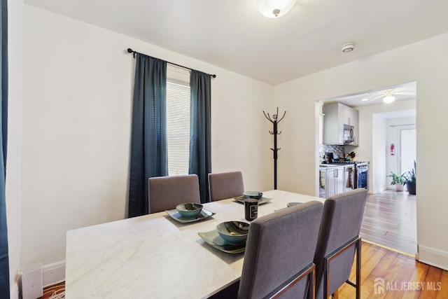 373 Rushmore Ave, Piscataway, NJ 08854 - dining space with light wood-style flooring and ceiling fan
