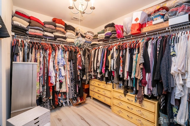 105 Recklesstown Way, Chesterfield, NJ 08515 - spacious closet with a chandelier, wood finished floors, and visible vents