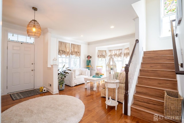 105 Recklesstown Way, Chesterfield, NJ 08515 - foyer featuring stairway, crown molding, wood finished floors, and a wealth of natural light