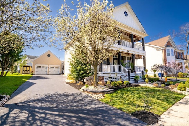 105 Recklesstown Way, Chesterfield, NJ 08515 - traditional-style house featuring a detached garage, a front yard, an outbuilding, a balcony, and covered porch