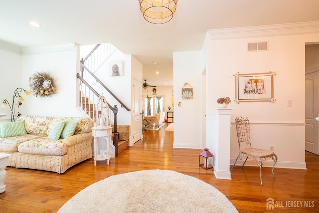 105 Recklesstown Way, Chesterfield, NJ 08515 - living area with stairs, baseboards, visible vents, and wood finished floors
