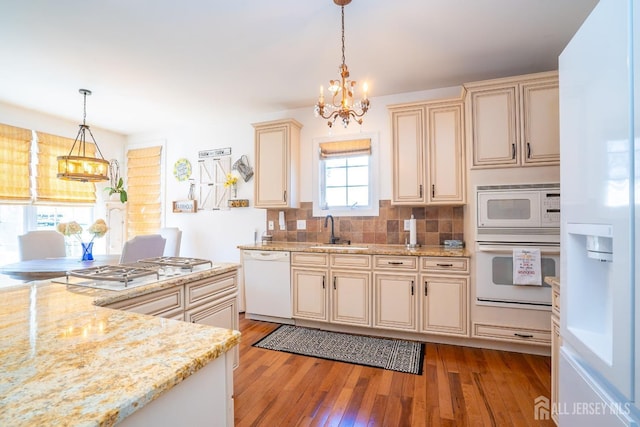 105 Recklesstown Way, Chesterfield, NJ 08515 - kitchen featuring white appliances, light wood-type flooring, cream cabinets, a chandelier, and a sink
