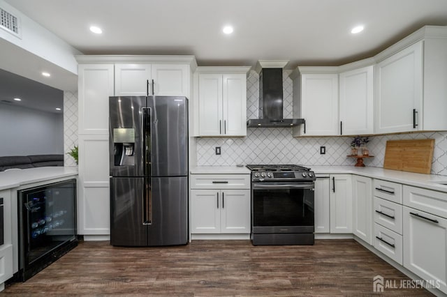 18 Chipper Dr, South Brunswick, NJ 08824 - kitchen featuring stainless steel appliances, wall chimney exhaust hood, wine cooler, light countertops, and recessed lighting
