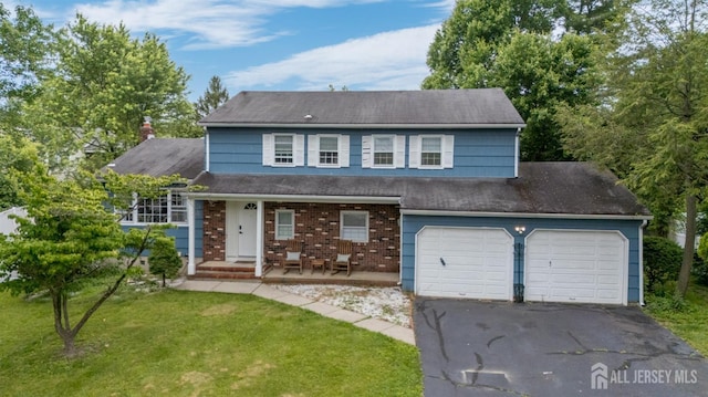18 Chipper Dr, South Brunswick, NJ 08824 - view of front of property with covered porch, driveway, a front lawn, a shingled roof, and brick siding