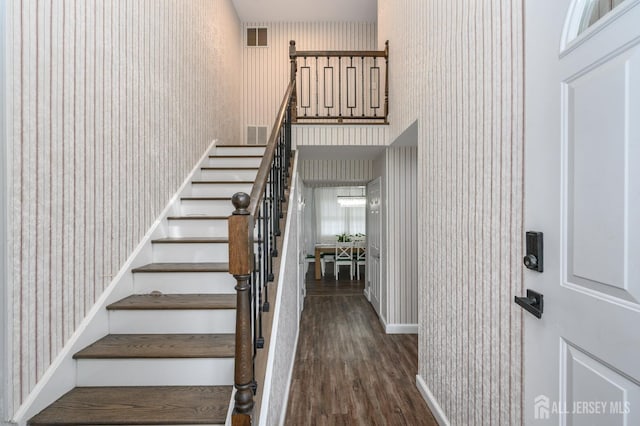 18 Chipper Dr, South Brunswick, NJ 08824 - stairs with wallpapered walls and wood finished floors