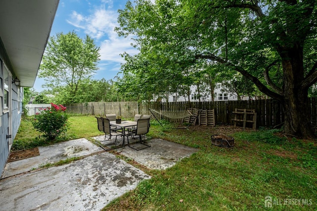 18 Chipper Dr, South Brunswick, NJ 08824 - fenced backyard featuring a patio area and an outdoor fire pit