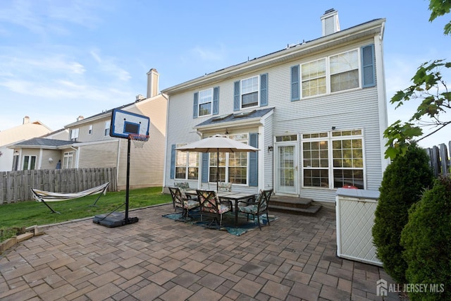 54 Magellan Way, Franklin Twsp, NJ 08823 - rear view of property featuring a patio, fence, and entry steps
